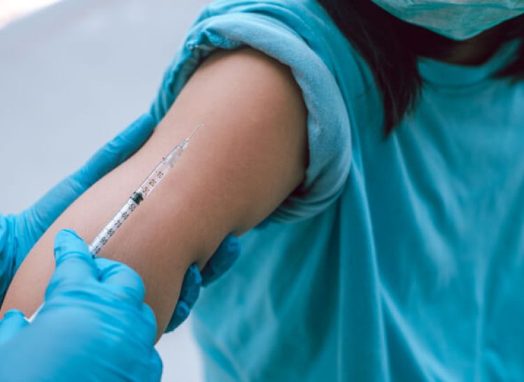 Community nurse providing medical care and injections to support individuals with disabilities in Dubbo